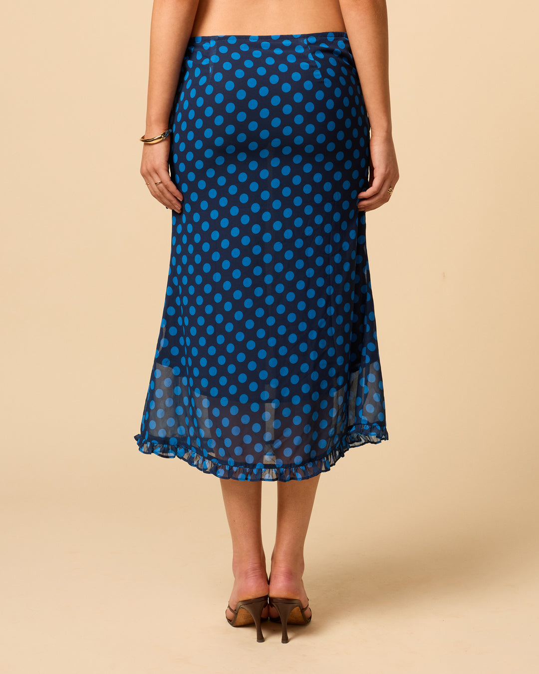 Women's sheer midi skirt ankle length with ruffle hem in blue polka dot