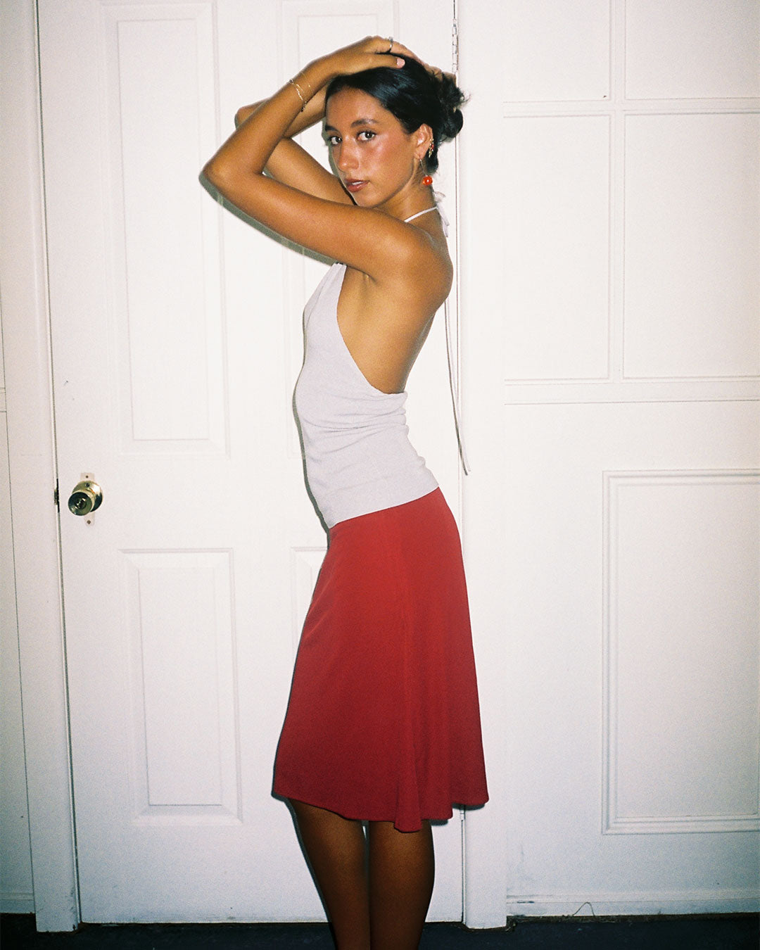 Harper Halter Top 90s-inspired high-neck halter in ribbed knit fabric