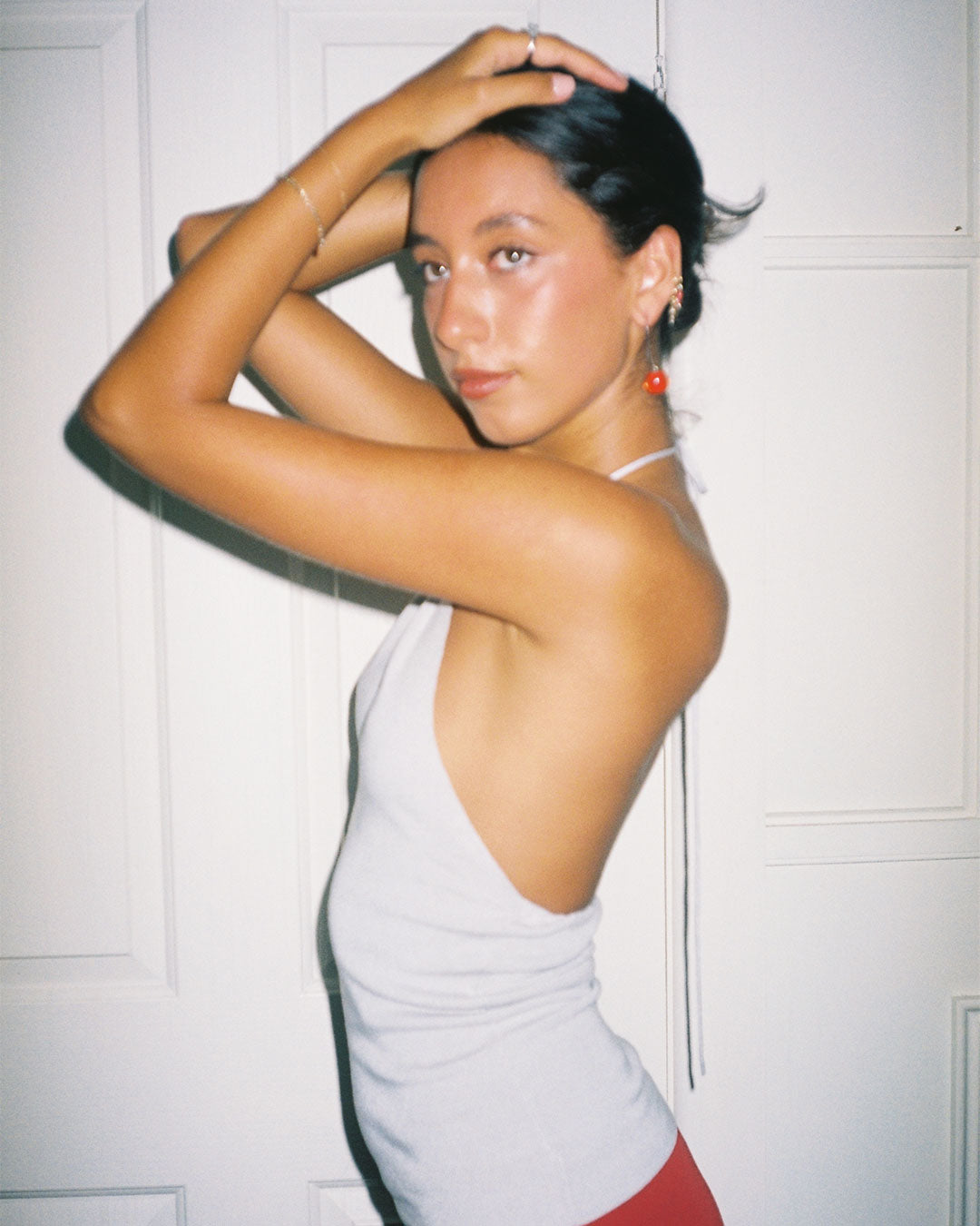 Harper Halter Top 90s-inspired high-neck halter in ribbed knit fabric