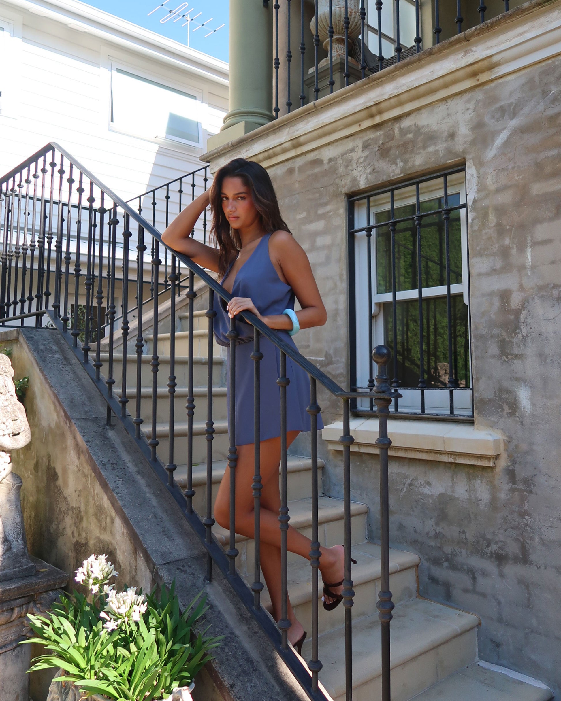 Women's mini wrap dress with button closure 