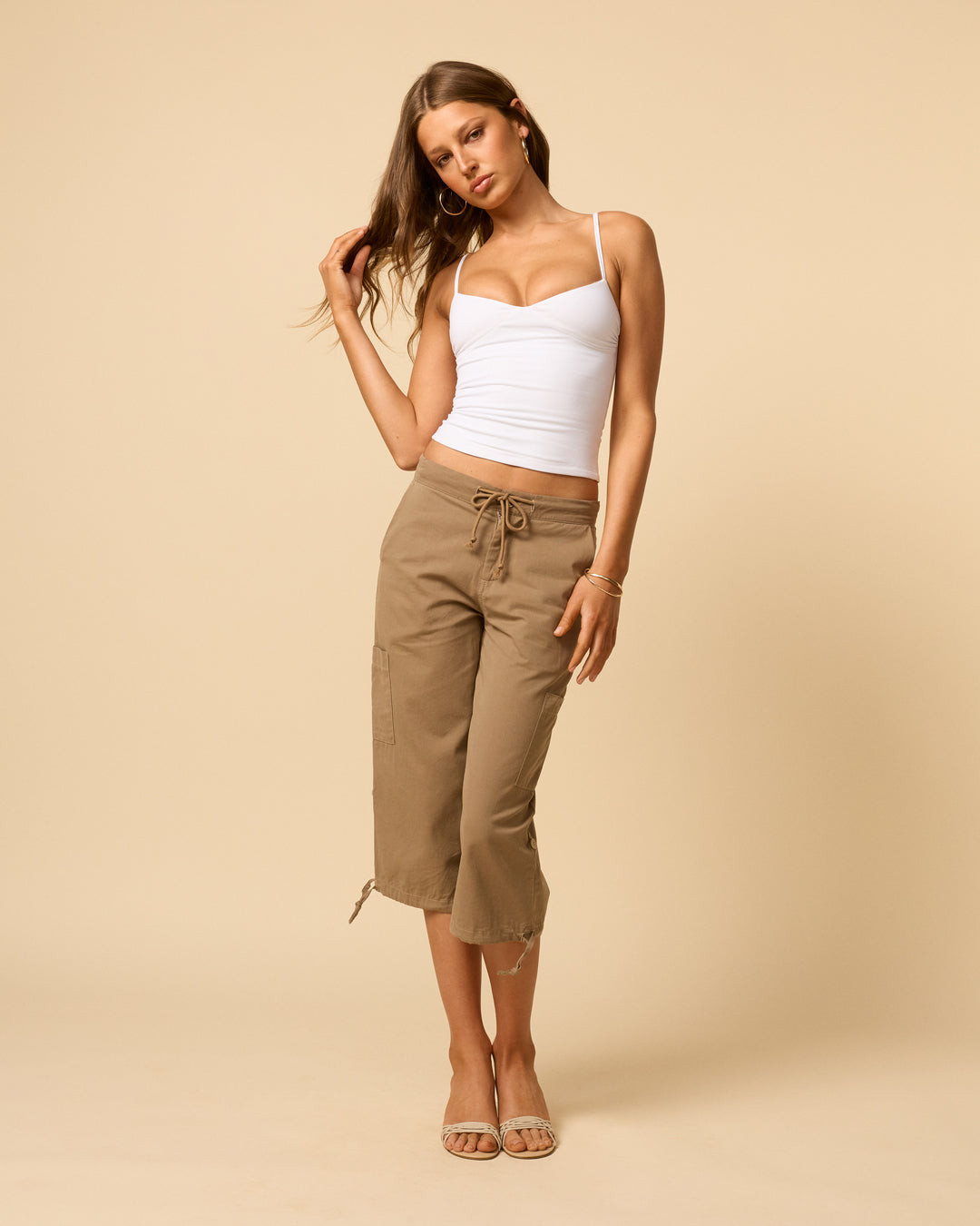 Low waisted cargo pants for woman with adjustable tie hem